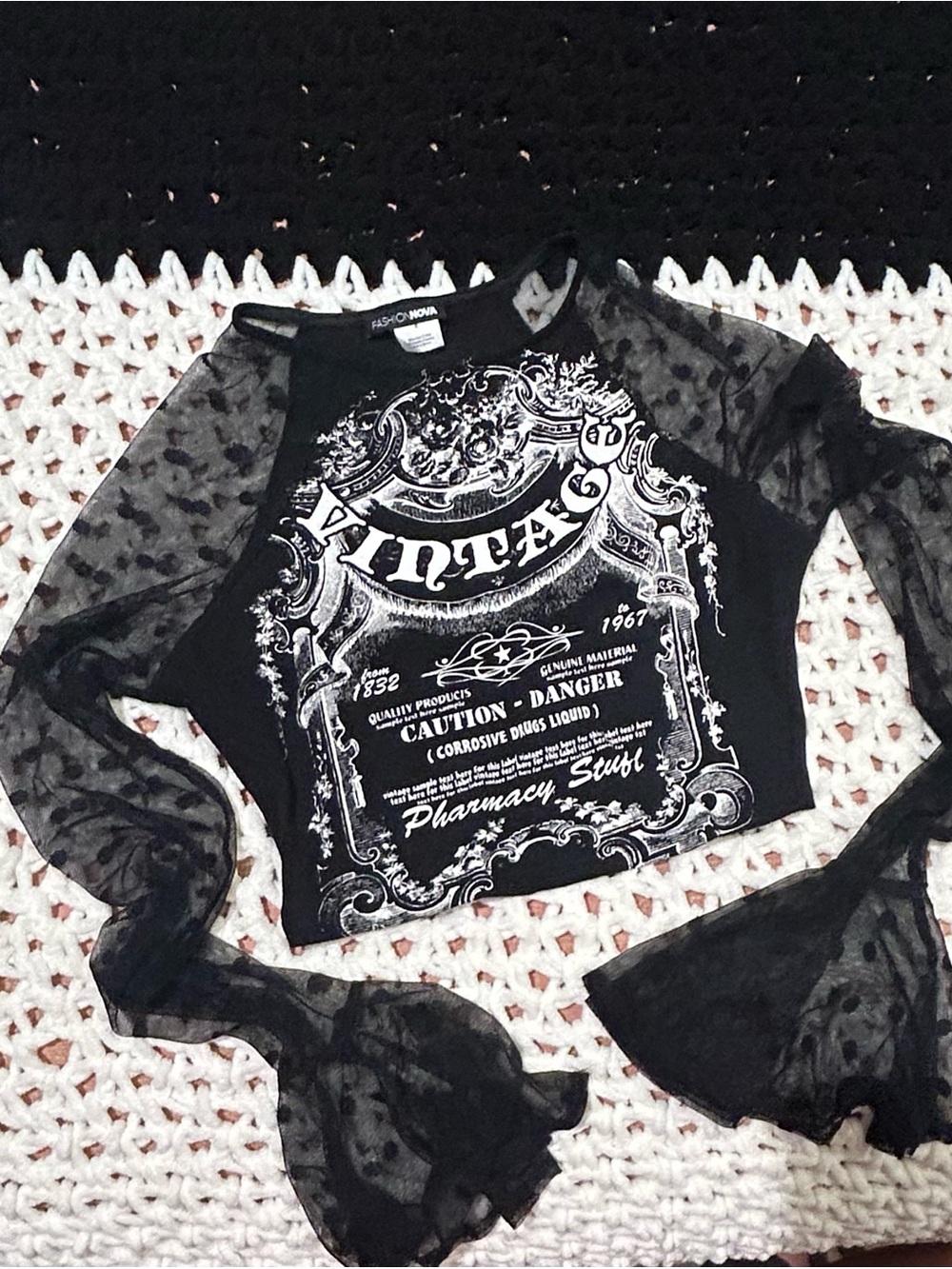 Fashion Nova Black Vintage Graphic Crop Top with Sheer Polka-Dot Sleeves
